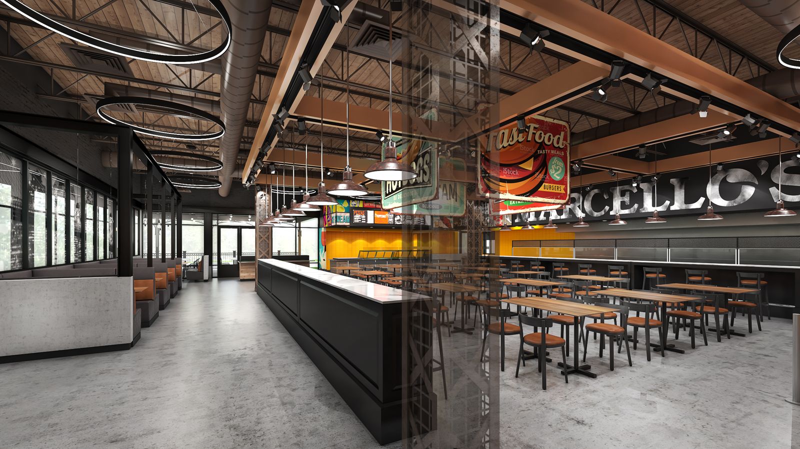Inside Marcello's: booths and tables under the Marcello's sign