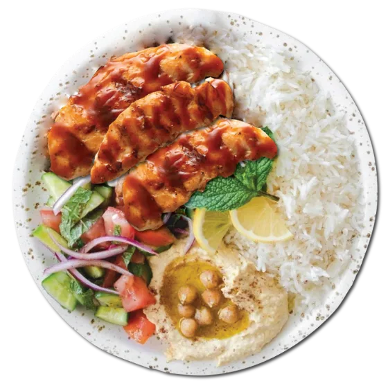 Shawarma plate with grilled chicken, rice, salad and hummus